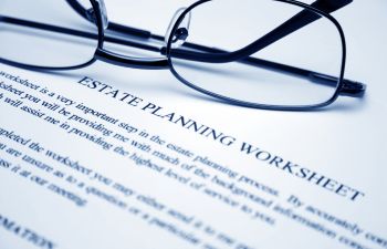 Estate planning worksheet on glasses on the desk of the attorney Augusta GA